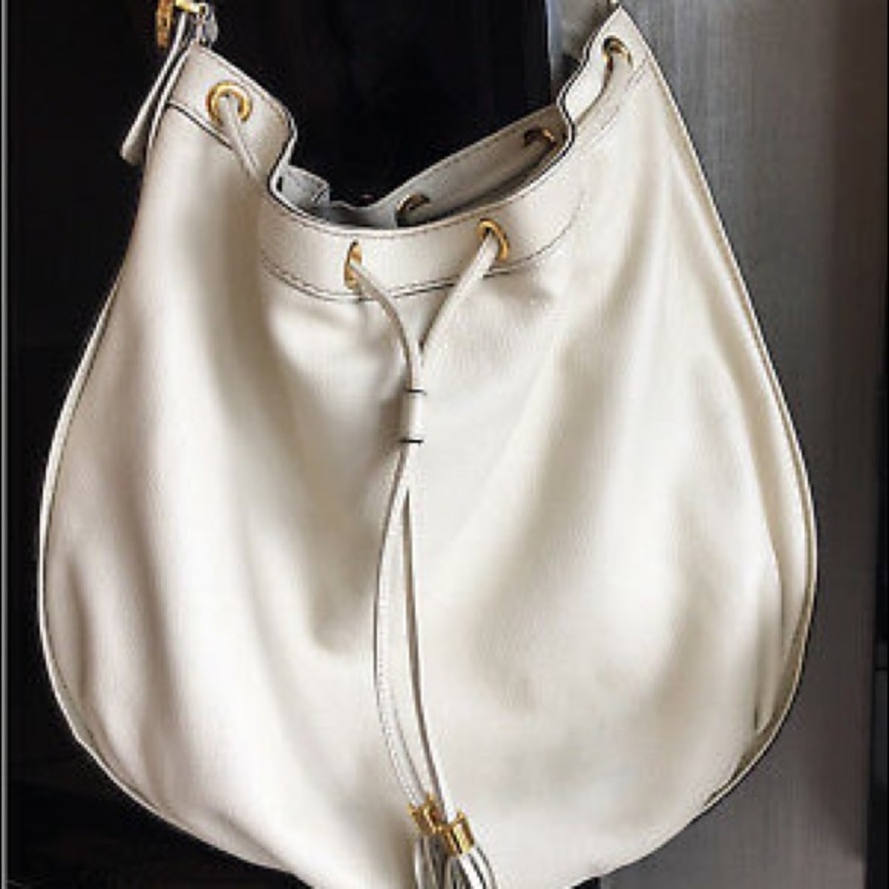 Authentic Gucci drawstring bag, cream color